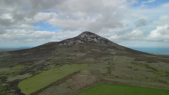 Angle toward mountain while elevating position