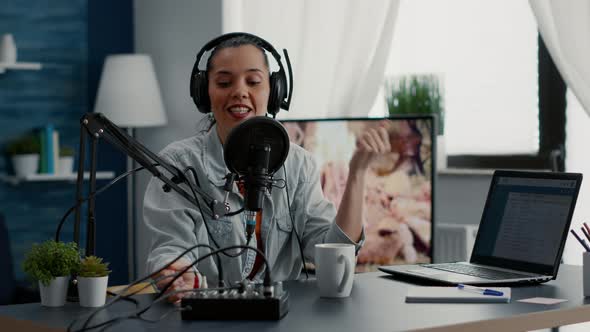 Famous Social Media Influencer Tweaking Knobs on Mixer While Recording Vlog