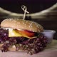 Appetizing Beef Burger Rotating on the Wooden Desk - VideoHive Item for Sale