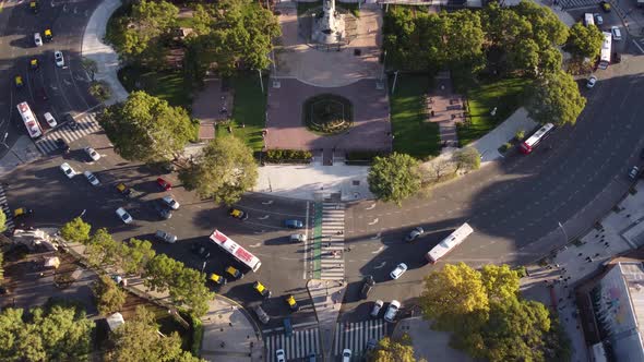 Tilt down aerial of busy roundabout in Buenos Aires