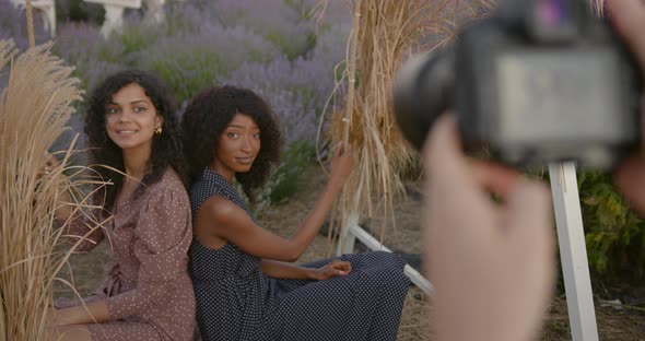 Multiracial Two Women Being Photographed in Lavender Field