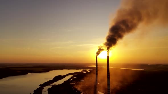 Power plant emission. Aerial view of smoking chimney of power plant