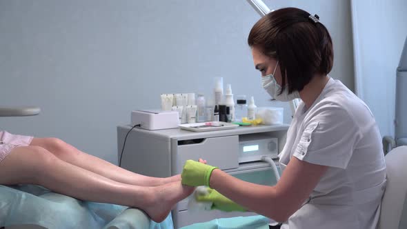 Padologist Prepares the Legs for the Procedure