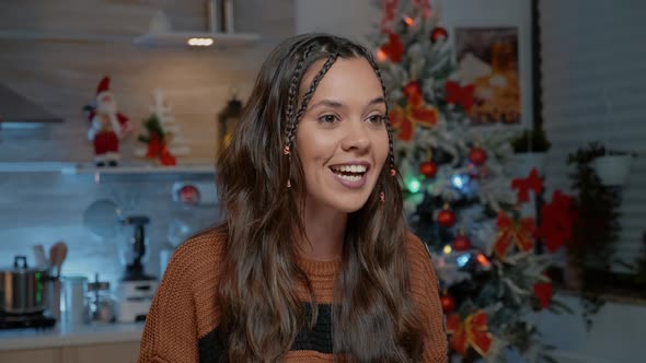 Happy Young Woman Talking on Video Call at Home