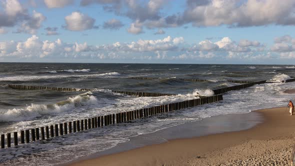 The Waves of the Baltic Sea are Breaking on the Breakwaters Slow Motion