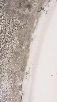 Vertical Video of Low Tide in the Ocean Near the Coast of Zanzibar Tanzania