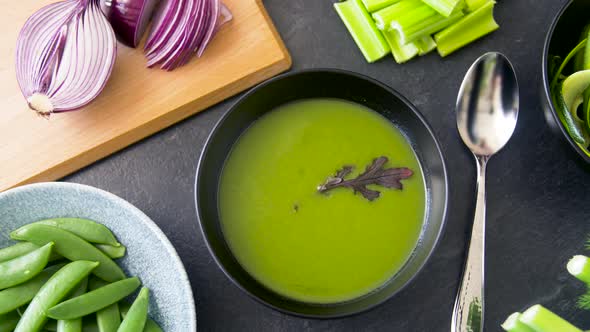 Close Up of Vegetable Green Cream Soup in Bowl