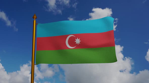 National flag of Republic of Azerbaijan waving with flagpole and blue sky