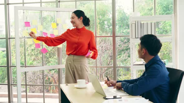 Business People Work on Project Planning Board