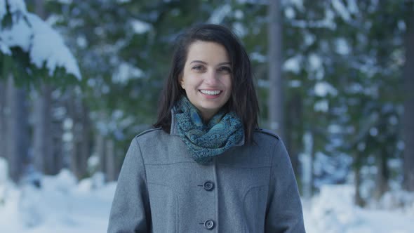 Girl smiling on a winter day alt