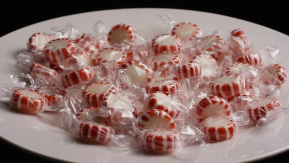 Rotating shot of peppermint candies - CANDY PEPPERMINT 014