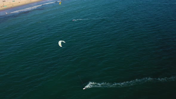 Aerial view of people doing water sport in Tarifa, Spain.