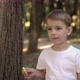 Boy in a White Shirt Eats Cookies - VideoHive Item for Sale