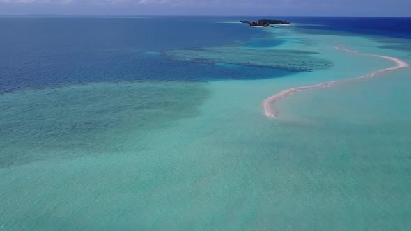 Drone view seascape of exotic coastline beach by blue sea with sand background