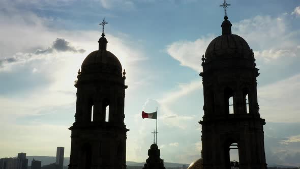 Drone flight over Plaza de las Americas with the Basilica of Zapopan in the background