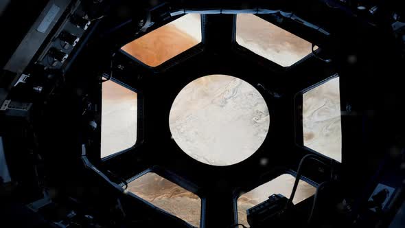 Jupiter through the Porthole of the International Space Station.