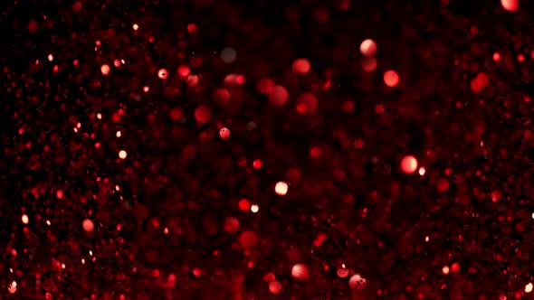 Red Glitter Explosion in Super Slow Motion Shooted with High Speed Cinema Camera