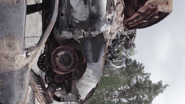 Vertical Video Irpin Ukraine  Burnt and Destroyed Cars