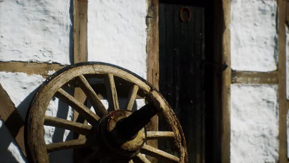 Old Wood Wheel and Black Door at White House