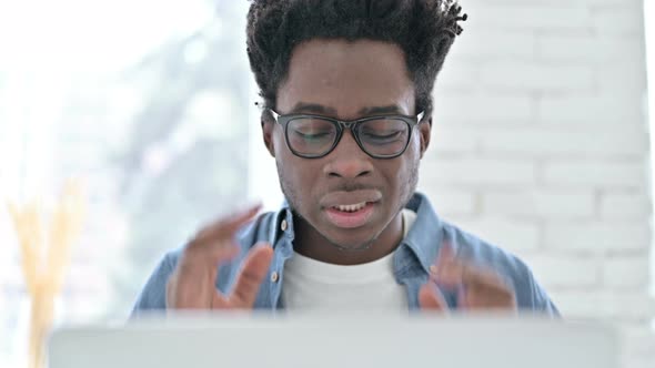 Portrait of Young African Man Having Headache