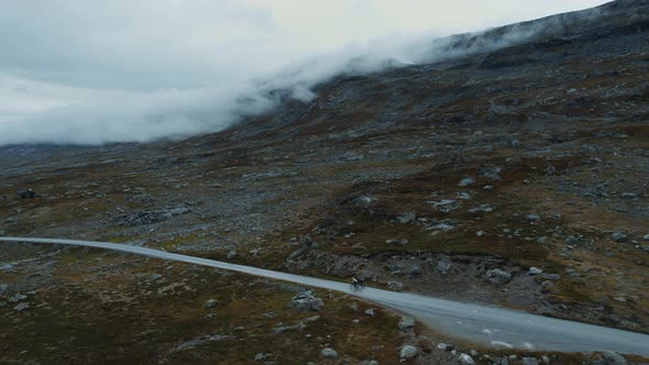 Aerial Drone Shot of Cyclists Compete in Speed