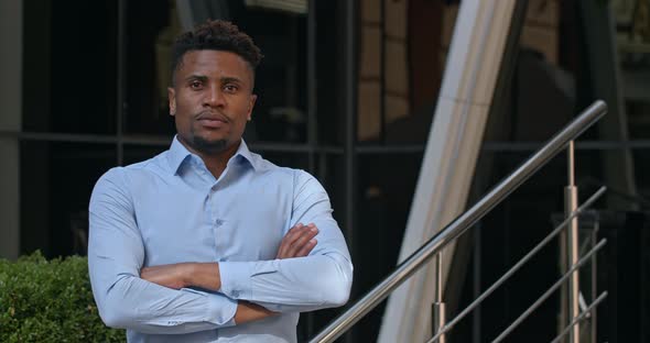 Portrait of Successful Male Team Leader or Businessman Standing Near Modern Office center, Handsome