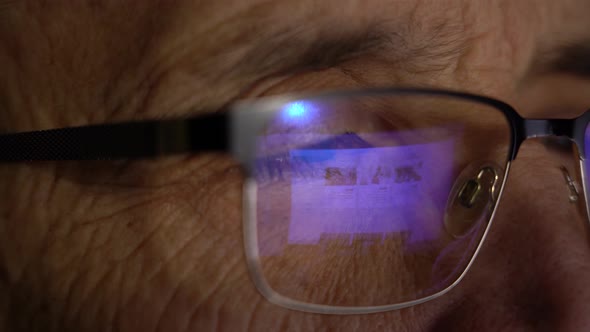 Eyes Of A Man With Glasses CloseUp Viewing Content On The Internet