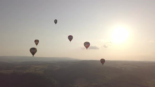 Baloons in the sunset