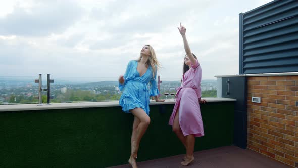 Beautiful Attractive Women on the Roof Top of Loft