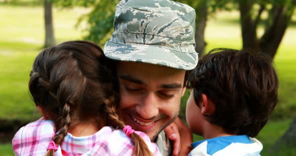 Happy soldier reunited with his son and daughter