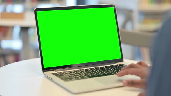 Male Hands Using Laptop with Green Chroma Key Screen Close Up