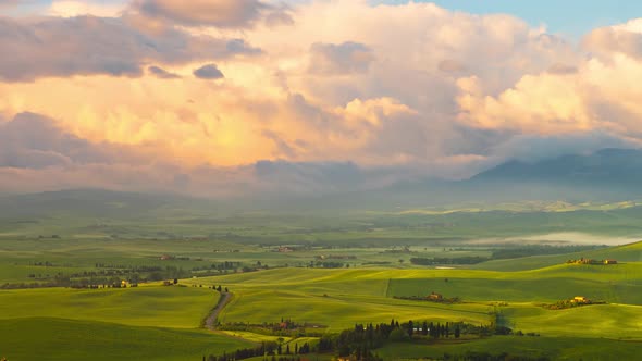 Time lapse of the morning fog and clouds in Tuscany Italy