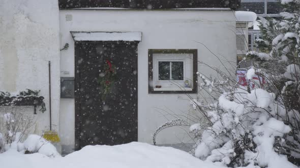 Front door during snowfall