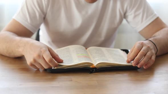 Sunday readings bible, a christian man reading the bible.