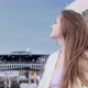 Video Portrait of Young Woman with Long Hair on City Background - VideoHive Item for Sale