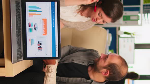 Diverse Colleagues Employees Cooperating in Office Discussing at Workplace