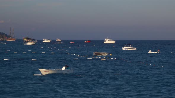 Boats Are Rolling on the Waves Near the Sea