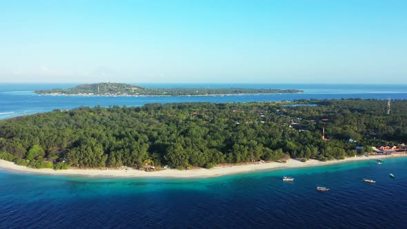 Aerial above landscape of perfect coastline beach break by turquoise sea and clean sandy background 