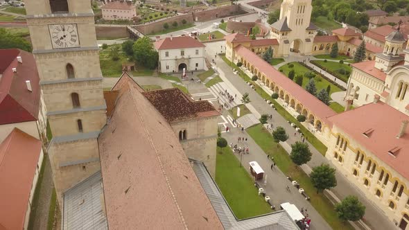 Aerial Panning shot of Church Tower with Clock , close up, in Alba Iulia of Citadel Alba-Carolina