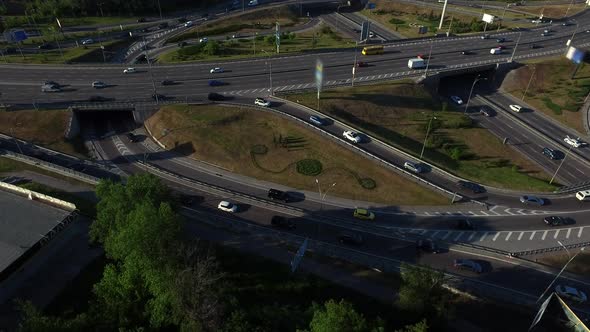 Car Driving on Roundabout Road. Aerial View Car Traffic on Highway Junction