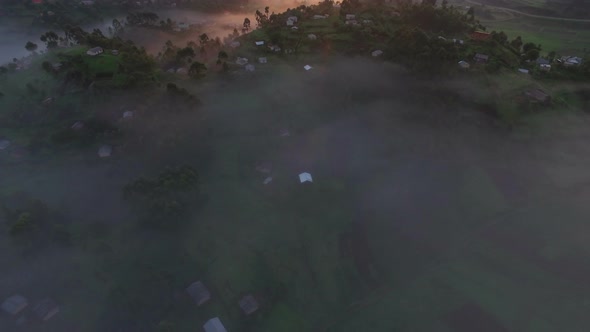 Aerial view of villages on a misty day, Uganda 