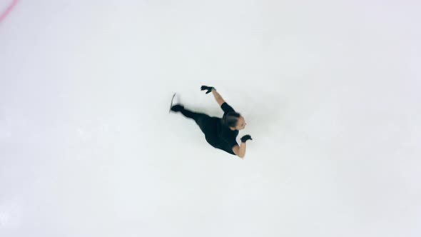 Figure Skater is Doing Skating Elements in a Top View