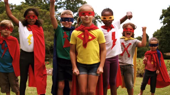 Group of kids pretending to be a super hero