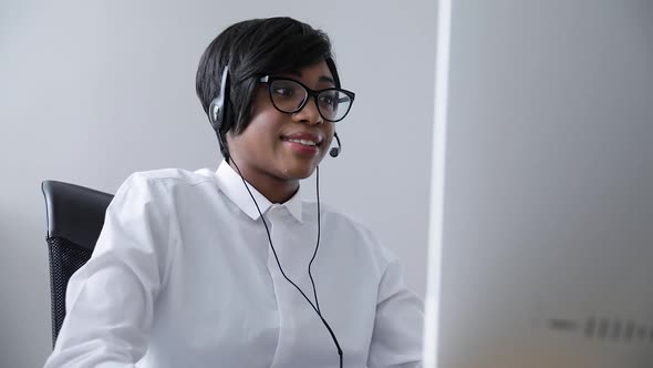 Customer Support. Afro-American Woman Working In Call Center