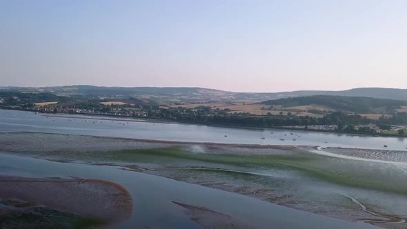 Landscape view of the beach town Lympstone England. The sky view shows the town, the beach, and the