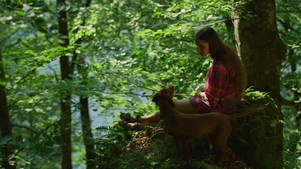 Girl talking to her dog