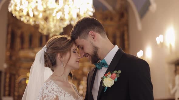 Newlyweds. Caucasian Bride and Groom Together in an Old Church. Wedding