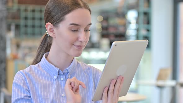 Portrait of Young Businesswoman Using Digital Tablet 