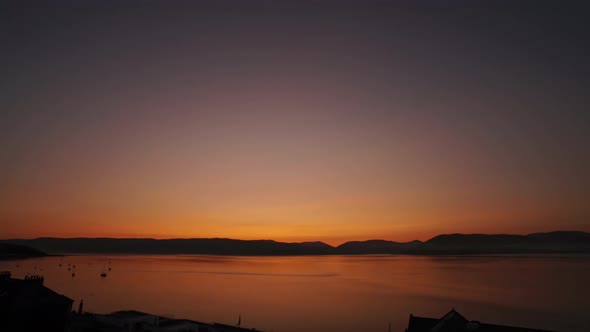 Golden Hour Changes To Blue Hour Behind Argyll Hills Over River Clyde At Gourock, Scotland