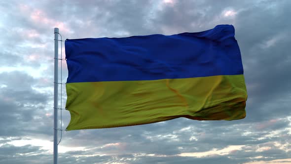 Realistic flag of Ukraine waving in the wind against deep dramatic sky